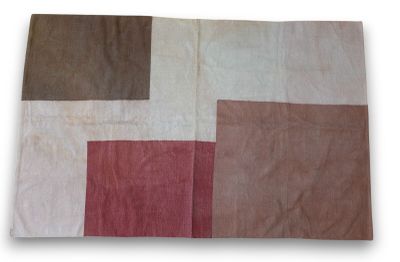 an image of a folded piece of fabric with different colors on it