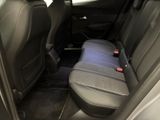 the back seats of a car with a seat belt in the back of it