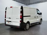 a white van that is parked inside of a building