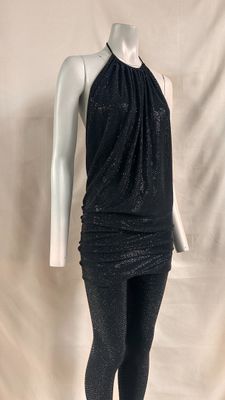 the mannequin is wearing a black top and leggings