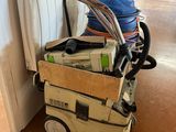 a cart that has a bunch of boxes on it