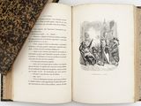 an open book with a picture of a man and a woman sitting on a bench
