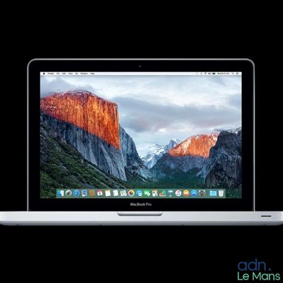 an apple macbook air laptop computer sitting on top of a table