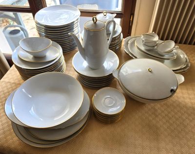 a table with a lot of plates and cups on it
