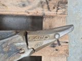 a pair of pliers that are on a pallet