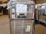 a large metal cart with a lot of items in it