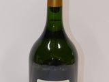 a bottle of wine that is sitting on a table