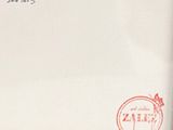 a white envelope with a stamp on it and a red stamp on it