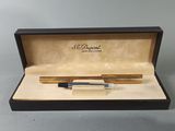 a pen that is in a box on a table