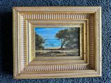 an image of a painting of a swing hanging on a wall