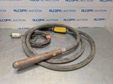 a hose that is sitting on the floor next to a hose