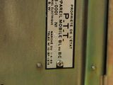 a close up of a metal box with a label on it