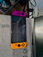 SWITCH NINTENDO avec deux manettes supplémentaires, support … (photo 2)