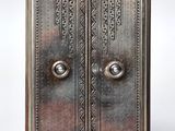 an image of a silver metal door with two open doors
