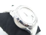 a close up of a watch on a black cloth
