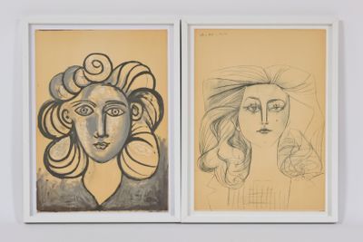 deux dessins représentant une femme et un homme accrochés au mur
