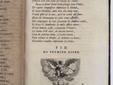 an open book with a picture of a bird on it