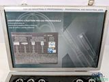 a metal case with four different types of tools in it