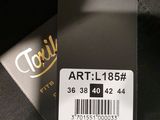 a close up of a tag on the back of a jacket