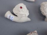 a group of clay animals that are sitting on a table