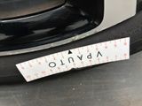 a sticker on the rim of a car that says abnio