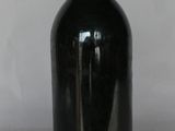 a bottle of wine that is sitting on a table
