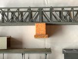 a model of a bridge that is on a table