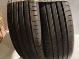 two tires are stacked on top of each other on a table