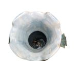 a white vase with a fish inside of it