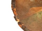 a close up of a bowl with a horse in it