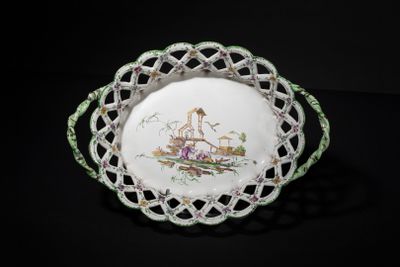 a white plate with a picture of a castle on it