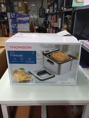 a box of food sitting on a table in a store