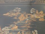 a picture of a painting on the wall of a room