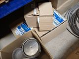 a box of boxes and a hose on the floor