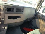 a dashboard of a car with a red seat belt