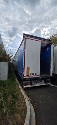 a truck that is parked on the side of the road