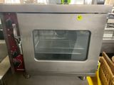 an image of a commercial oven in a kitchen