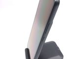 a close up of a cell phone on a stand