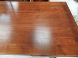 an image of a wooden table in a room