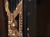 a close up of a door handle with a snake on it