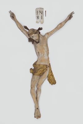 une image représentant un crucifix en bois auquel est suspendue une croix sur le côté
