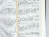 an open book that is sitting on a table