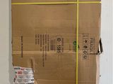 boxes stacked on top of each other in a warehouse