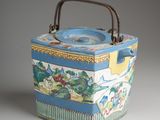 a blue and white box with a handle on it