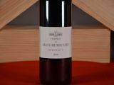 a bottle of wine that is sitting on a table