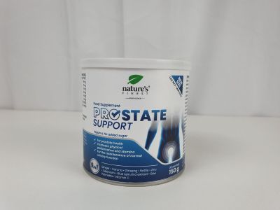 une boîte de compléments alimentaires pour la prostate posée sur une surface blanche