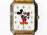 mickey mouse wrist watch with brown leather band and white face