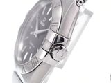 a close up of a wrist watch on a white surface
