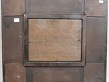 an old wooden picture frame with a square cut out of it