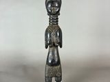 an image of a statue of a woman with a hat on her head